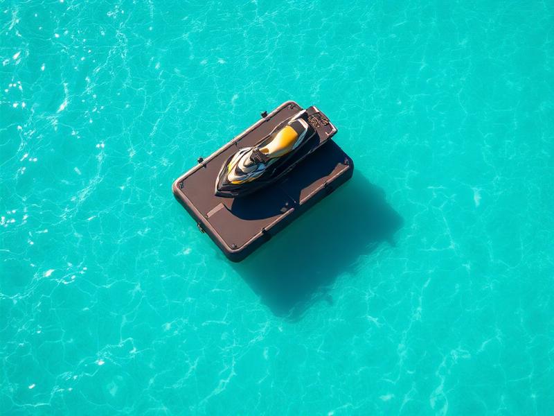 Jet ski parked on a modular floating drive-on dock platform